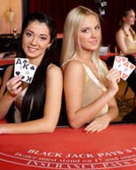 Live casino dealers showing cards
